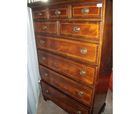 Quality reproduction mahogany inlaid early 19th C style chest with stepped cornice above three small, two short and four long