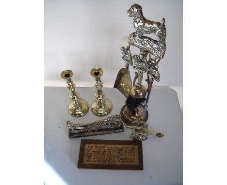 Pair of brass candlesticks, model brass cannon, fire companion set, school plaque and horse &amp; plough panel 