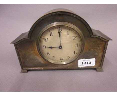 Silver plated mantel clock with a key wind French movement