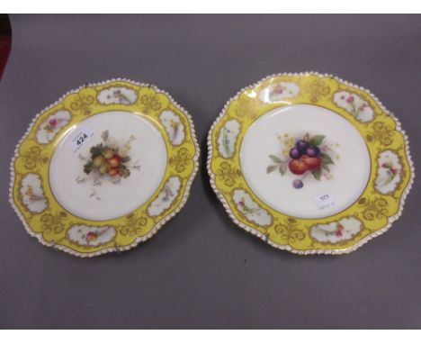 Pair of Royal Worcester cabinet plates painted with fruit, signed A. Lane