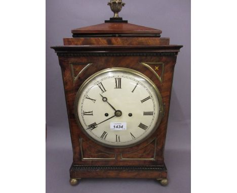 Regency mahogany and brass mounted bracket clock with a painted concave dial, Roman numerals and two train movement with engr