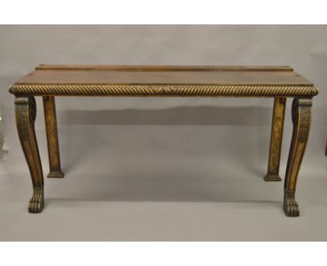 George IV mahogany console table, the gadroon moulded top above acanthus carved scroll shaped front supports with paw feet, 7