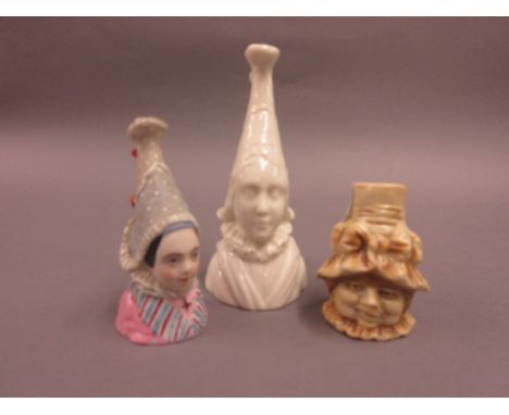 Royal Worcester candle snuffer of a Bretagne lady, together with two other candle snuffers