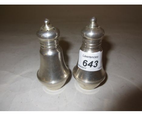 Pair of Sterling silver weighted condiments by Duchin