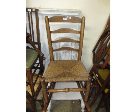 19th Century elm ladder back rocking chair