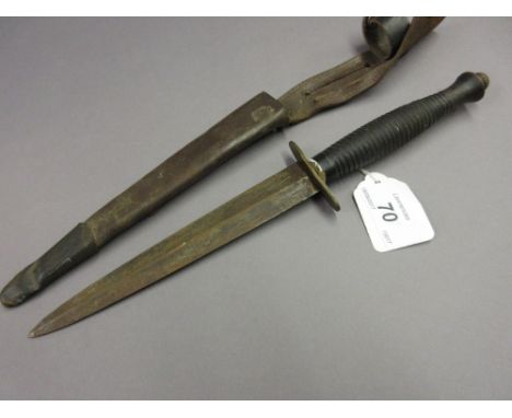 World War II Commando knife with leather scabbard