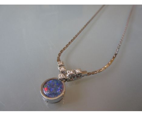 14ct White gold opal and diamond set pendant necklace