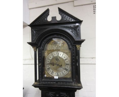 19th Century carved oak longcase clock, the brass broken arch dial with silvered chapter ring having Roman and Arabic numeral