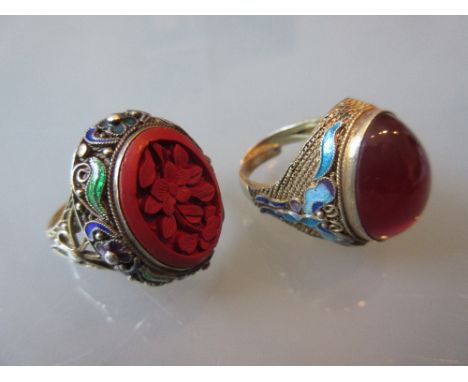 Two Chinese silver gilt enamel decorated rings