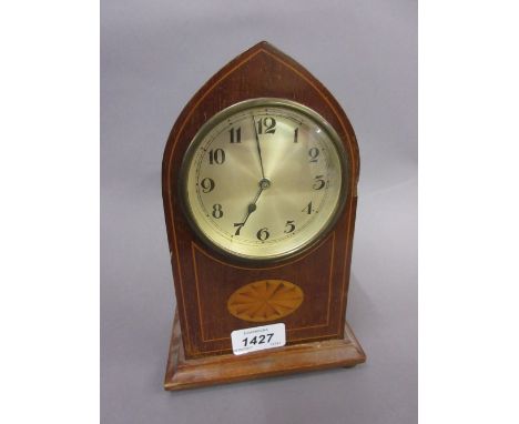 Small Edwardian mahogany line and lunette inlaid lancet shaped mantel clock