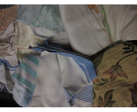 Suitcase containing a quantity of miscellaneous vintage tablecloths
