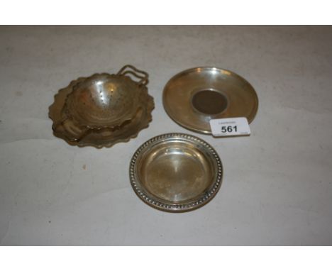 Birmingham silver tea strainer and stand, small silver dish inset with a Churchill crown and two small Sterling silver trinke