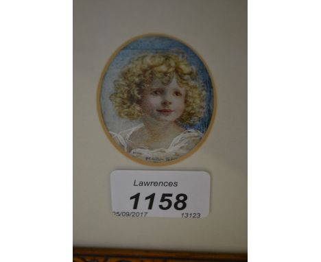 Maria Eaton, R.A., two signed miniature paintings, portrait of a child and, flower study