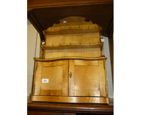 Miniature Continental pine dresser with a shelf back above a serpentine base with two panelled doors