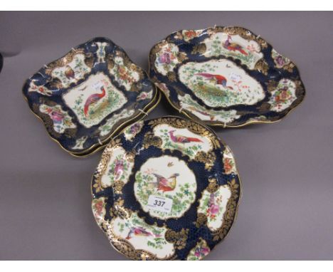 19th Century English pottery eight piece part dessert service painted on print base, exotic birds on a blue fish scale ground