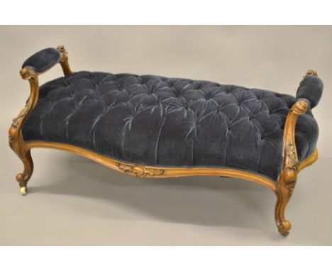 Good quality Victorian carved walnut rectangular serpentine shaped blue button velvet upholstered stool with scroll arms, cab
