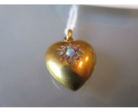 15ct Gold opal and diamond set heart shaped pendant