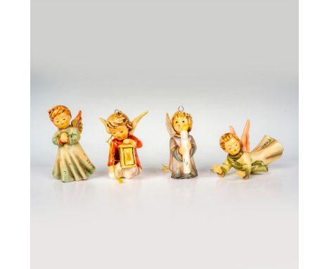 4 hand painted porcelain angel figures. Includes Peace On Earth (HUM 484), Angelic Guide (HUM 571), Light Up The Night (HUM 6