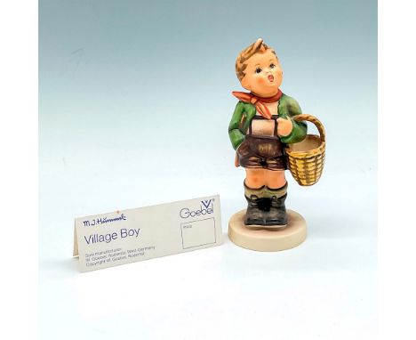 Matte finished, hand painted boy in traditional clothing of the time, carrying a basket. Colored in browns, green and orange.