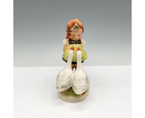 Little girl posed in front of 2 geese with hands behind her back. Colored in bright yellow, orange and green. Hummel impresse