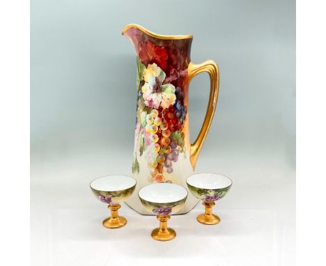 Tall pitcher with hand painted purple, red and green grapes; gold handle and rim. Signed R. Schulz. P&amp;P backstamp. Dimens