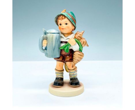 Matte finished figurine depicting a young boy holding a mug and turnips. Includes Gold 60th Anniversary hang tag. Goebel back