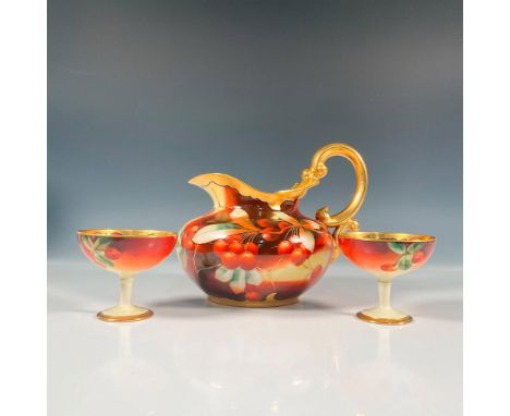Attractive hand painted set that includes 2 cups with its matching pitcher. This set is decorated with stemmed cherries on le