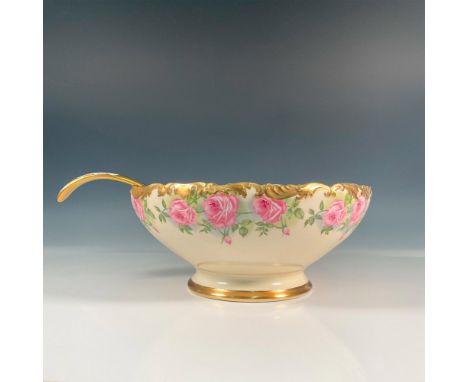 In lovely pink, green, and white tones, this piece features delicate pink rose branch decor and fine gold trim. Includes porc