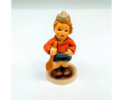 This figurine depicts a young boy in a sailor's outfit. It has the Goebel backstamp on the bottom. Item comes with its origin