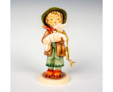 Hand painted in matte finish. A young boy holds a baby lamb that has been lost. 1992 final issue. Goebel backstamp. This item