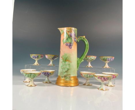 An elegant, tall tankard hand-painted with matching cups. Luscious purple, red, and green grapes, accentuated with radiant go