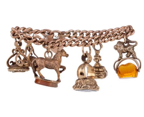 GOLD SEAL FOB CHARM BRACELET,with six fobs including one partially set with pearls and one carved with 'Sophia', along with a
