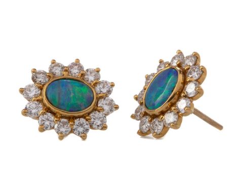 PAIR OF IMPRESSIVE BLACK OPAL AND DIAMOND EARRINGS,set with oval black opals within a halo of round brilliant cut diamonds to