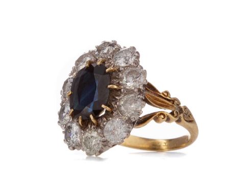 NATURAL SAPPHIRE AND DIAMOND CLUSTER RING,the oval sapphire of approximately 2.93 carats within halo of diamonds totalling ap