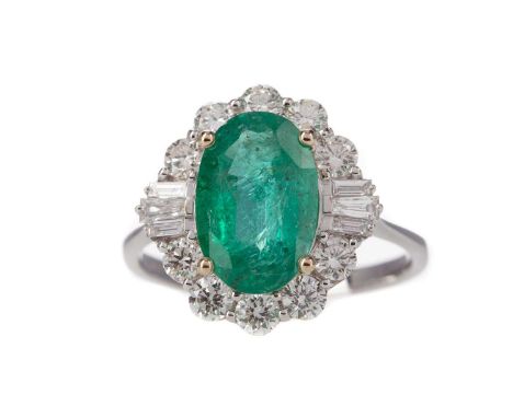 CERTIFICATED EMERALD AND DIAMOND CLUSTER RING,the oval emerald of approximately 2.46 carats, with evidence of oiling, within 