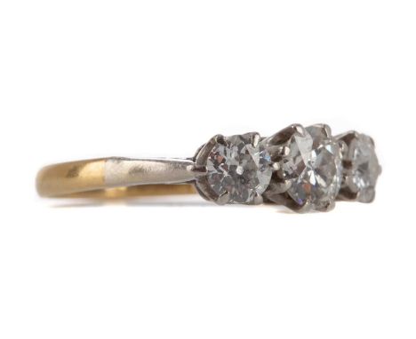 DIAMOND THREE STONE RING,the Old European cut diamonds totalling approximately 0.85 carats, unmarked, size I, 2.5gCondition r