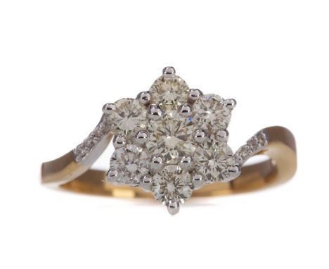 DIAMOND FLOWER CLUSTER RING,set with round brilliant cut diamonds totalling approximately 1.00 carats, in eighteen carat whit