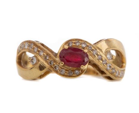 RUBY AND DIAMOND RING,with a high set ruby above a diamond set twist, in eighteen carat gold, size Q, 5.7gCondition report: C