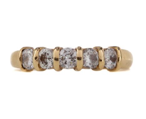 DIAMOND FIVE STONE RING,the round brilliant cut diamonds totalling approximately 0.76 carats, in eighteen carat gold, size N,