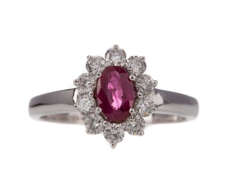 CERTIFICATED RUBY AND DIAMOND CLUSTER RING,the oval ruby with evidence of thermal enhancement, of approximately 0.50 carats w