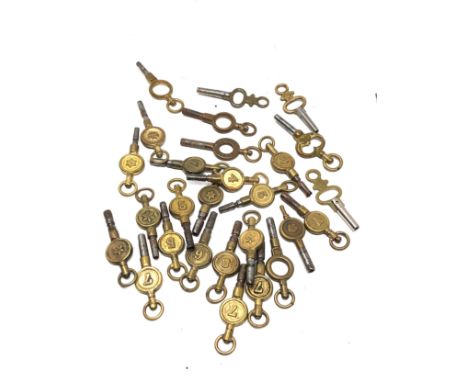 large collection of antique pocket watch keys 