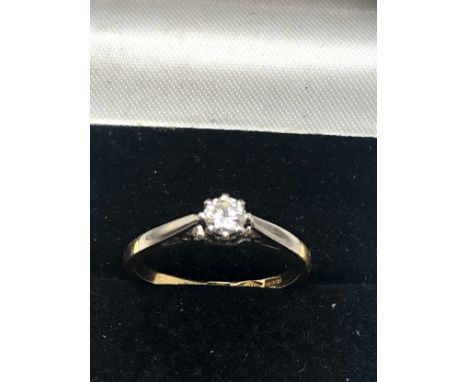 18ct  gold diamond ring set with central diamond measures approx 4mm dia weight 2g 
