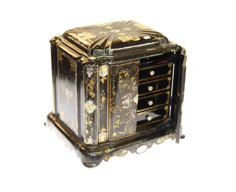 Papier mache and mother of pearl inlay table cabinet with lidded top and double doors enclosing four drawers