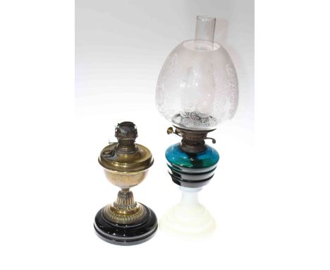 Brass oil lamp base and white and green glass based oil lamp with etched glass shade