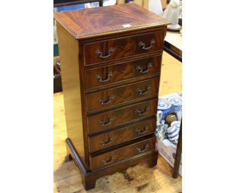 Slim mahogany six drawer chest on bracket feet