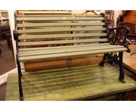Cast and wood slat wood garden bench