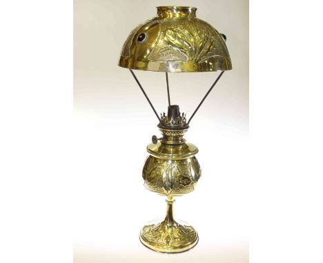 Embossed brass oil lamp with jewelled shade