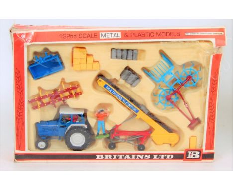 Britains No.9590 Gift Set comprising of Ford 5000 Tractor, Multi-Level Elevator, Rotary Tedder, Cultivator and other accessor