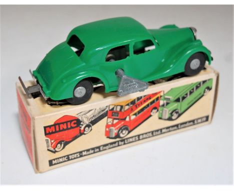 Triang Minic Post War, Reversing Riley, green plastic body with reversing button to front, chrome fittings, cast hubs, in the