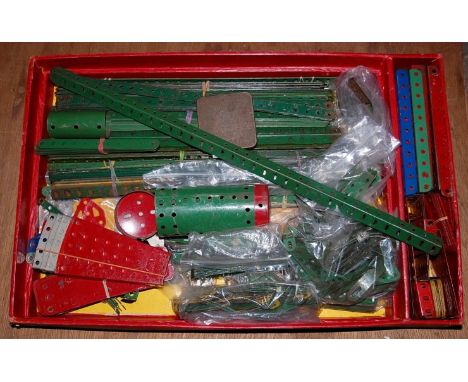A large quantity of mixed 1950s and later Meccano, all in used condition, to include flat sections, straights, wheels, Meccan